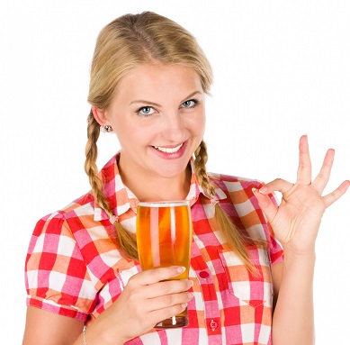 A woman drinking a lager - hire a Heineken beer pump in Manchester, Liverpool and the North West beer pump hire